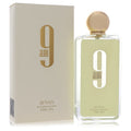 Afnan 9 AM Eau de Parfum 100ml - Frasco transparente con tapa dorada esférica y caja blanca marfil